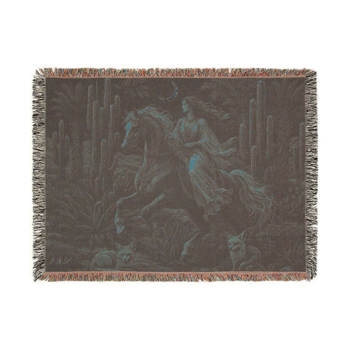 A rectangular woven throw blanket with fringed edges, featuring a dark fantasy scene of a woman riding a horse through a desert landscape with cacti and a wolf, shown on a plain white background.