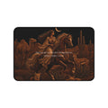 A rectangular desk mat with rounded corners featuring a dark desert scene illustration. The artwork shows a woman riding a horse, with a camel, cacti, a deer, and small foxes in warm brown and tan tones against a black background.