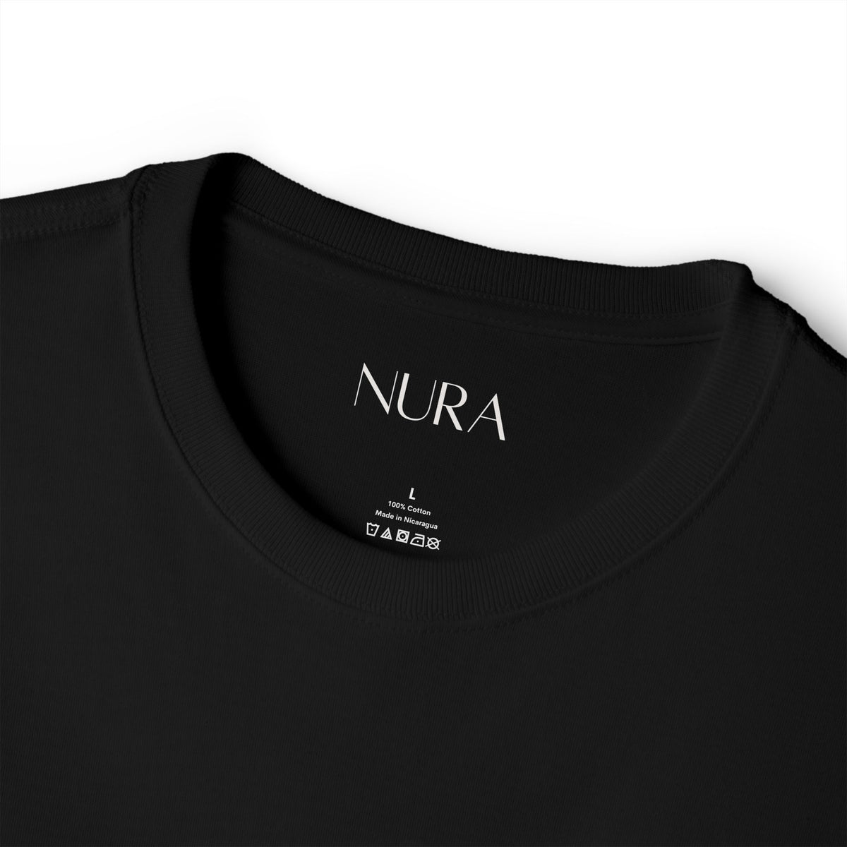 Close-up of a black polo shirt collar with two dark buttons, photographed against a plain white background.